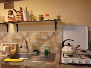 Η κουζίνα ή μικρή κουζίνα στο La Casita de Gabriel