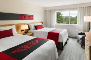 Letto o letti in una camera di Kwa'lilas Hotel
