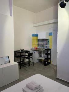 Kuchyň nebo kuchyňský kout v ubytování Accomodation Libertino