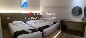THE BEST LOCATION客房内的一张或多张床位