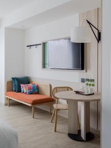 Sjónvarps- og/eða afþreyingartæki á Boutech JianTan Hotel
