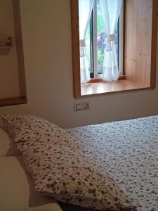 Postel nebo postele na pokoji v ubytování A Casiña de Mera