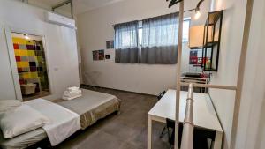 Postel nebo postele na pokoji v ubytování Accomodation Libertino