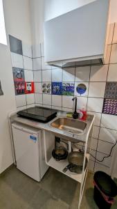 Kuchyň nebo kuchyňský kout v ubytování Accomodation Libertino