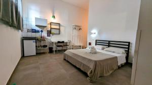 Postel nebo postele na pokoji v ubytování Accomodation Libertino