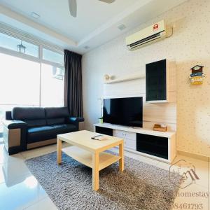 Телевизор и/или развлекательный центр в Senai Garden Apartment near Senai Airport&JPO