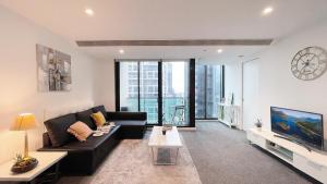 Кът за сядане в Melbourne One 2B2B1C Apartment by GoodLive