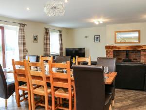 a dining room with a table and chairs at Stackyard House in Spennymoor