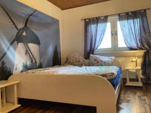 Säng eller sängar i ett rum på Mühlenurlaub Südheide