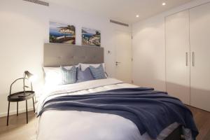 Cama o camas de una habitación en SHH - D1 Tower Apartments