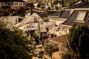 an overhead view of a house with boxes on the roofs at Bekkjarvik Gjestgiveri in Bekkjarvik