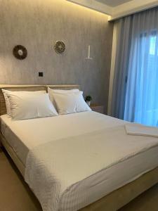 Postel nebo postele na pokoji v ubytování Cactus Villas