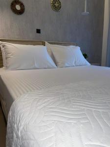 Postel nebo postele na pokoji v ubytování Cactus Villas