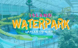an island water park atatlantic city with the island water park logo at Beachfront Double Queen - CozySuites in Atlantic City