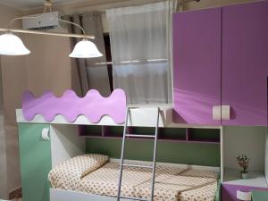 Krevet ili kreveti na kat u jedinici u objektu Casa Rosada