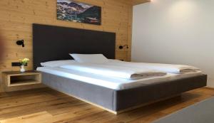 Postel nebo postele na pokoji v ubytování B&B Obermair + 28 fotografií