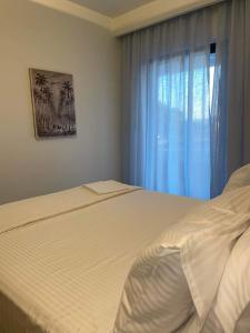 Postel nebo postele na pokoji v ubytování Cactus Villas