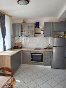 Kuchyň nebo kuchyňský kout v ubytování Panorama Pakoštane