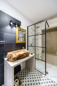 a bathroom with a sink and a shower at Fortuna in Nerežišće +27 photos
