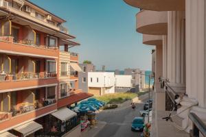 a view of a street from a building at bellissimo студио близо до плажа in Ravda
