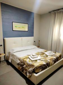 Rúm í herbergi á Albergo Piazza Risorgimento
