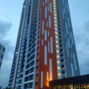 a tall red building with a lot of windows at JOVIAL Modern Cozy Homestay `Meritus Perai in Perai