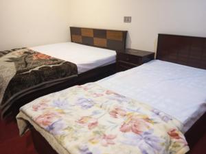 Postel nebo postele na pokoji v ubytování Stream View Guest House