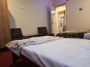 Postel nebo postele na pokoji v ubytování Stream View Guest House