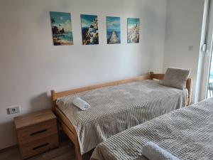 Katil atau katil-katil dalam bilik di Apartment Esperanto next to the Aqua Park +38 gambar