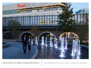 a man and woman walking in front of a fountain at Minet Gardens Central - Suite 3 in London