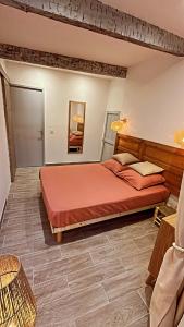 Cama o camas de una habitación en Appartement T2 centre village