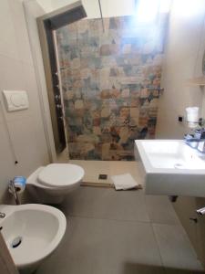 Baðherbergi á Albergo Piazza Risorgimento
