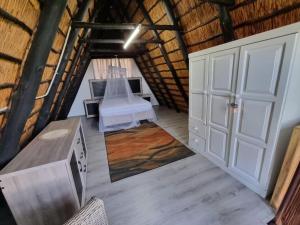 Posezení v ubytování Bietjie Bos Chalet