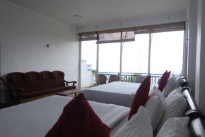 Postel nebo postele na pokoji v ubytování Nilowin Glenanore Guesthouse