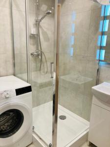 Ένα μπάνιο στο Apartamenty Every Sky Plac Ratuszowy 30