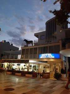 a building with a dog on the top of it at Hotel Hipica Park in Platja d'Aro