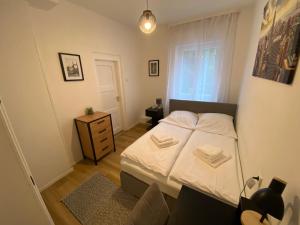 Postel nebo postele na pokoji v ubytování Swan Rooms