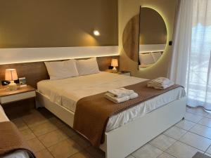 Postel nebo postele na pokoji v ubytování Island Apartments