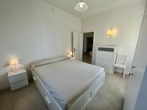 Postel nebo postele na pokoji v ubytování Insulae