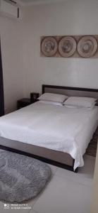 Cama ou camas em um quarto em Берізка