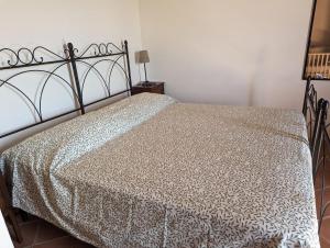 A bed or beds in a room at Agriturismo Torre Gialluise