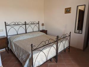 A bed or beds in a room at Agriturismo Torre Gialluise