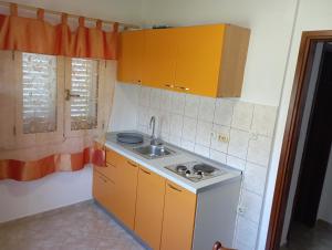 Kuchyňa alebo kuchynka v ubytovaní Apartmans Lavanda Island Hvar