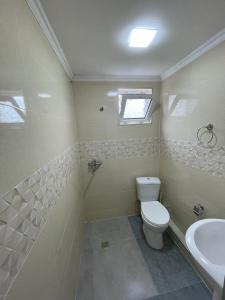 Kúpeľňa v ubytovaní Kudigora Guesthouse