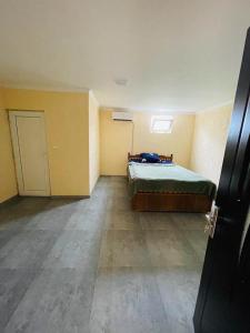 Posteľ alebo postele v izbe v ubytovaní Kudigora Guesthouse