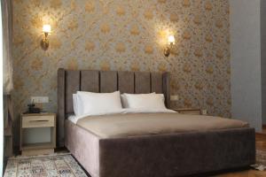 Postel nebo postele na pokoji v ubytování Hotel 1883 + 37 fotografií