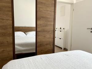Postel nebo postele na pokoji v ubytování Katarina