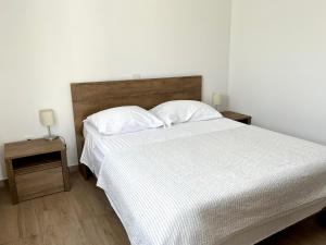 Postel nebo postele na pokoji v ubytování Katarina