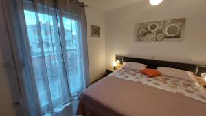 Postel nebo postele na pokoji v ubytování Apartment close to Krk town centre