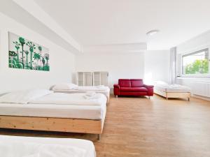 Кровать или кровати в номере RAJ Living - 1 or 3 Room Apartments with Balcony - 20 Min Messe DUS & Airport DUS